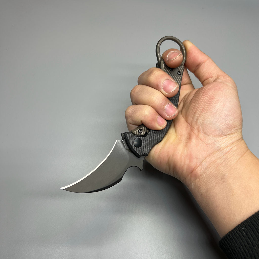 Fox Bastinelli 591 Luxury Black Bird Folding Karambit 2.25" Elmax Black Blade, Carbon Fiber Titanium Handles