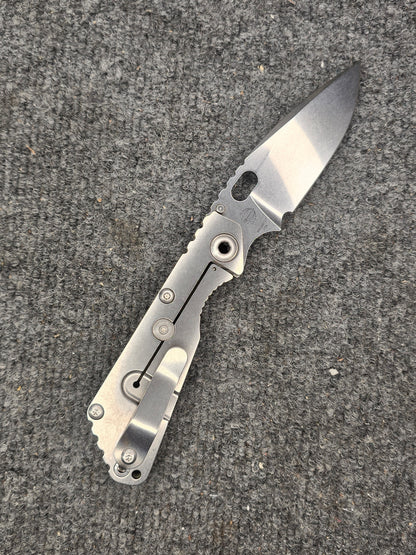 Mick Strider SnG MagnaCut Folding Knife – Textured OD Green G10 & Anodized Titanium