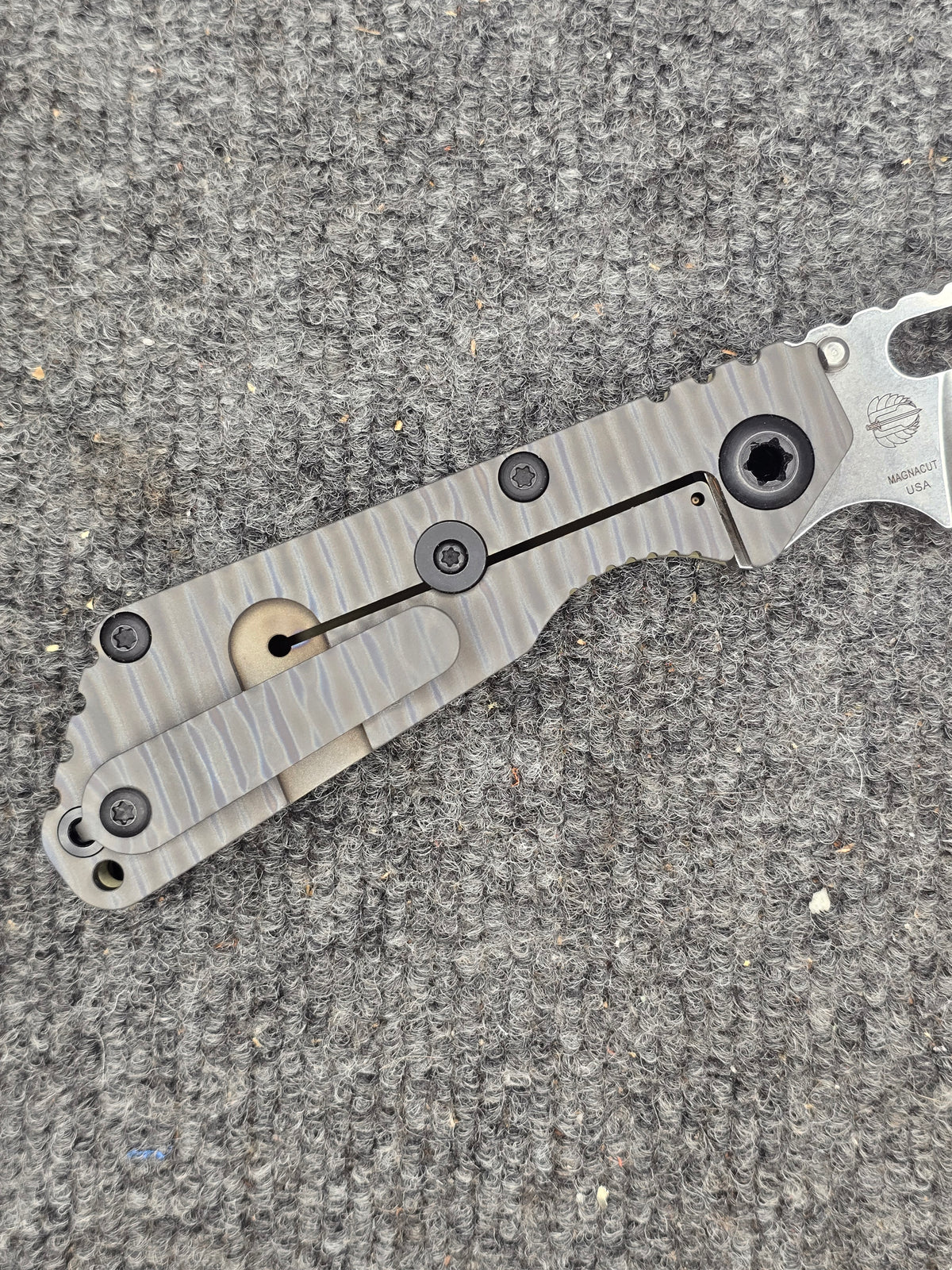Mick Strider SnG MagnaCut Folding Knife – Textured OD Green G10 & Anodized Titanium