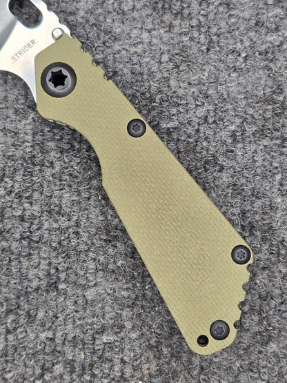 Mick Strider SnG MagnaCut Folding Knife – Textured OD Green G10 & Anodized Titanium