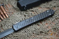Microtech 106 Makora OTF AUTO 4.45" Black Double Combo Edge Blade, Carbon Fiber Handle