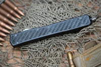 Microtech 106 Makora OTF AUTO 4.45" Black Double Combo Edge Blade, Carbon Fiber Handle