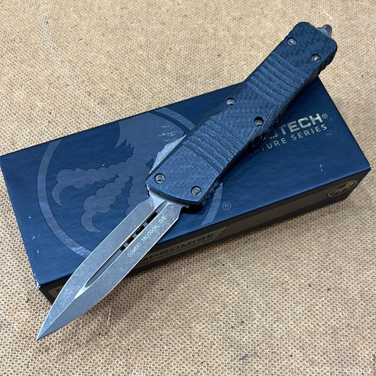 Microtech 142-13APCFS Signature Series Combat Troodon Bronze Apocalyptic D Dagger Blade, Black handle with Carbon Fiber Top