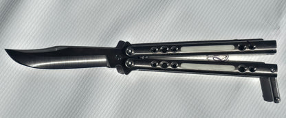 BaliBalistic ported and white G10 inlaid 1/2 inch thick titanium channel cut handles with a latch that are paired up to a Bowie clip point blade