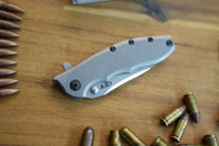 Zero Tolerance 0562TI Hinderer Flipper Knife 3.5" CPM-20CV Satin/Stonewashed Plain Blade, Titanium Handles