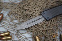 Microtech 138-16S Signature Series Troodon AUTO OTF 3.06" Damascus Double Edged Dagger Blade, Black Aluminum Handles