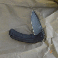 Bastinelli Creations Red IKBS Frame Lock Folding Knife 3.4" M390 Black PVD Stonewashed Drop Point Blade, Milled Black G10 Handle