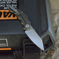 Bastinelli Creations D Vil Mini Dragotac Folding Knife 2.875" M390 Stonewashed Wharncliffe Blade, 3D Machined Black G10 and Bronze Titanium Handles