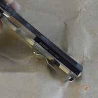 Bastinelli Creations D Vil Mini Dragotac Folding Knife 2.875" M390 Stonewashed Wharncliffe Blade, 3D Machined Black G10 and Bronze Titanium Handles