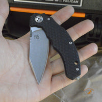 Bastinelli Creations D Vil Mini Dragotac Folding Knife 2.875" M390 Stonewashed Wharncliffe Blade, 3D Machined Black G10 and Bronze Titanium Handles