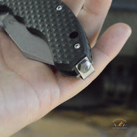 Bastinelli Creations D Vil Mini Dragotac Folding Knife 2.875" M390 Stonewashed Wharncliffe Blade, 3D Machined Black G10 and Bronze Titanium Handles
