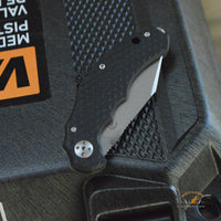 Bastinelli Creations D Vil Mini Dragotac Folding Knife 2.875" M390 Stonewashed Wharncliffe Blade, 3D Machined Black G10 and Bronze Titanium Handles