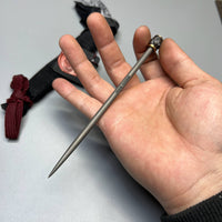 Bastinelli Creations Titanium Short Chopstick Spike, 5.95" Overall, 2 Saints Tactical Bronze Handle