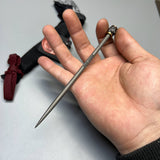 Bastinelli Creations Titanium Short Chopstick Spike, 5.95" Overall, 2 Saints Tactical Bronze Handle