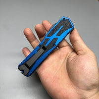 Heretic Knives Colossus OTF AUTO 3.5" CPM-MagnaCut DLC Clip Point Blue Aluminum Handles with Black Traction Inlays