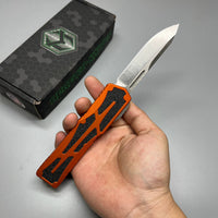 Heretic Knives Colossus OTF AUTO 3.5" CPM-MagnaCut Stonewashed Clip Point Combo Blade, orange Aluminum Handles