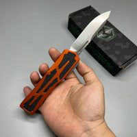 Heretic Knives Colossus OTF AUTO 3.5" CPM-MagnaCut Stonewashed Clip Point Combo Blade, orange Aluminum Handles
