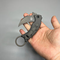 Fox Bastinelli 591 Luxury Black Bird Folding Karambit 2.25" Elmax Black Blade,  Carbon Fiber Titanium Handles
