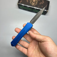 Heretic Knives Manticore S OTF AUTO 2.55" CPM-MagnaCut Black DLC Double Edge Dagger Blade, Blue Aluminum Handle with Blue CamoCarbon Top - H024-6A-BLU/CF
