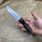 BUSSE Custom G10 base and wooden handle inlaid with mammoth fossil mosaic rivets INFI  RadioActive Mean street